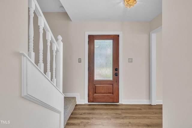 4309 Birmingham Way, Raleigh, NC 27604 - entrance foyer with stairs and wood finished floors