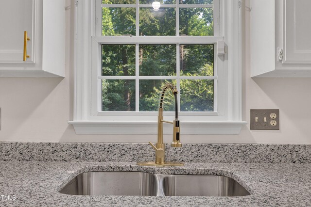 4309 Birmingham Way, Raleigh, NC 27604 - kitchen view of white cabinetry and light stone counters