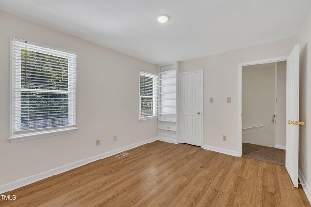 4309 Birmingham Way, Raleigh, NC 27604 - unfurnished bedroom with light wood-style floors and baseboards