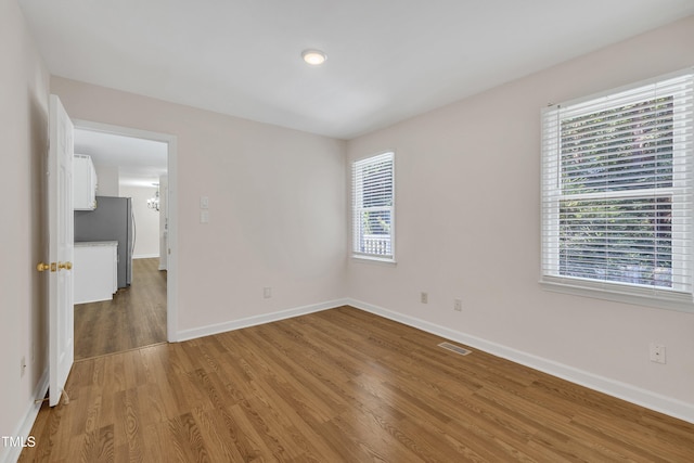 4309 Birmingham Way, Raleigh, NC 27604 - unfurnished room featuring wood finished floors and baseboards