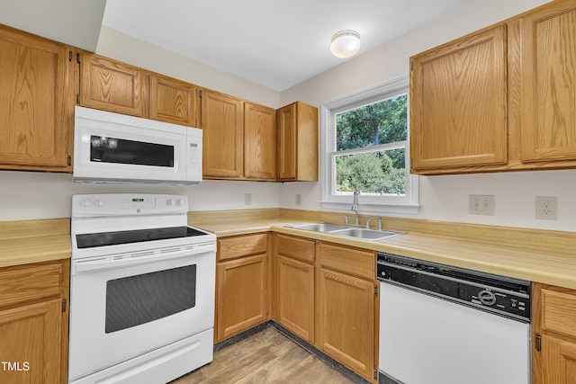 4309 Birmingham Way, Raleigh, NC 27604 - kitchen featuring white appliances, light countertops, and light wood-type flooring