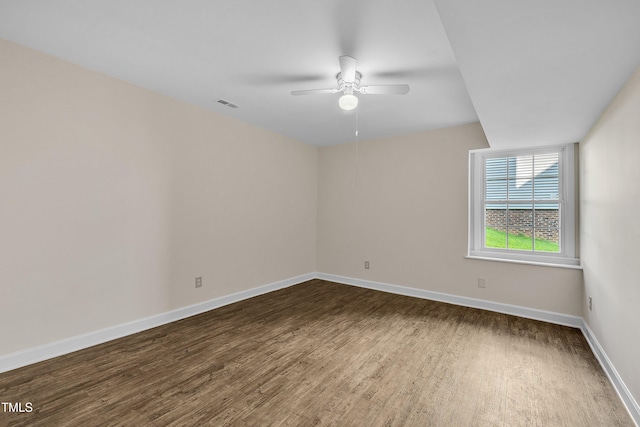 4309 Birmingham Way, Raleigh, NC 27604 - empty room featuring dark wood finished floors and a ceiling fan
