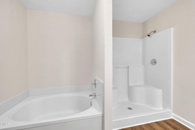 4309 Birmingham Way, Raleigh, NC 27604 - full bathroom with a bath, wood finished floors, and a shower