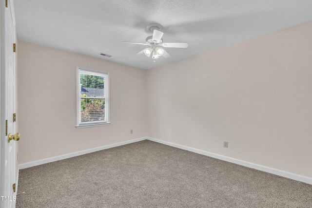 4309 Birmingham Way, Raleigh, NC 27604 - empty room featuring carpet flooring, ceiling fan, and a textured ceiling