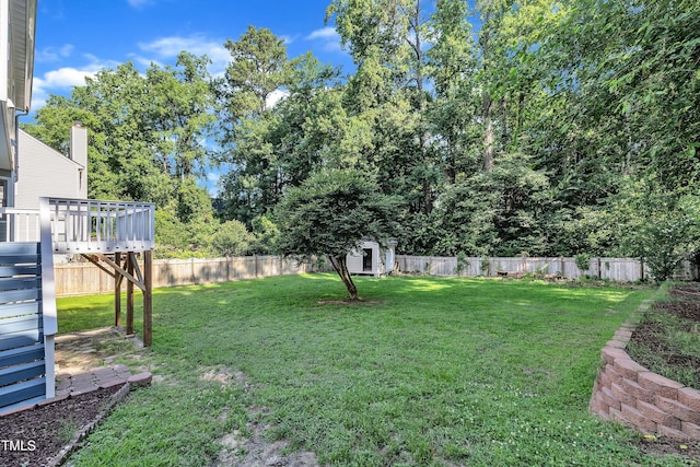 4309 Birmingham Way, Raleigh, NC 27604 - fenced backyard featuring a storage unit, a wooden deck, and stairs