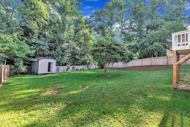 4309 Birmingham Way, Raleigh, NC 27604 - fenced backyard featuring a storage unit