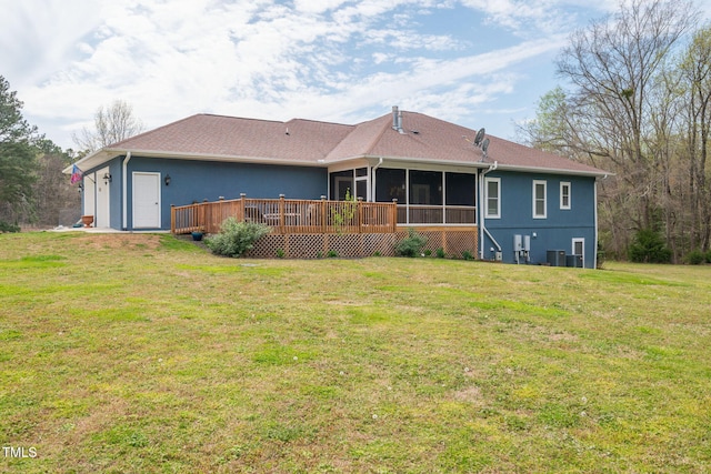 169 Skippers Lndg, Manson, NC 27553 - rear view of house with a sunroom, a yard, a deck, and stucco siding