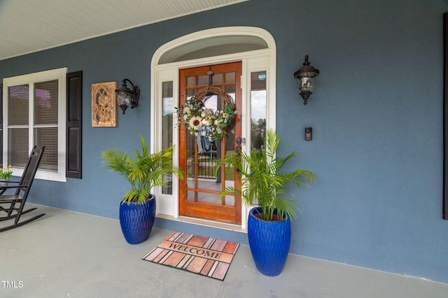 169 Skippers Lndg, Manson, NC 27553 - doorway to property with stucco siding and covered porch