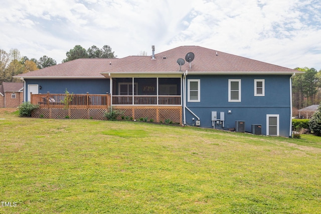 169 Skippers Lndg, Manson, NC 27553 - rear view of property with stucco siding, a sunroom, a yard, and a deck