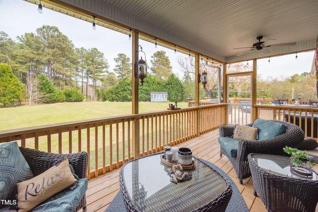 169 Skippers Lndg, Manson, NC 27553 - sunroom / solarium with a ceiling fan, an outdoor living space, and view of wooded area