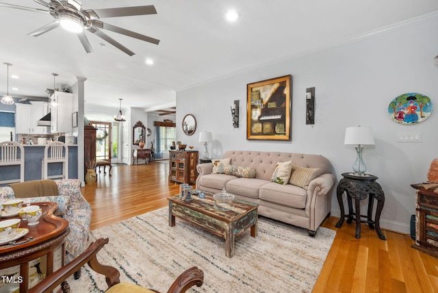 169 Skippers Lndg, Manson, NC 27553 - living room featuring a ceiling fan, crown molding, light wood-style flooring, and recessed lighting