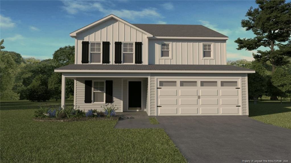 0 Aberdeen Dr, Aberdeen, NC 28315 - view of front of home with board and batten siding, asphalt driveway, a front lawn, an attached garage, and a porch