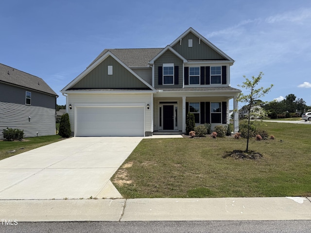 14 Gallop Rein Cir, Benson, NC 27504 - craftsman-style home with a front lawn, an attached garage, board and batten siding, and driveway