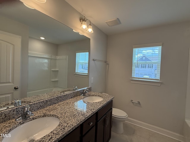 14 Gallop Rein Cir, Benson, NC 27504 - bathroom with double vanity, tile patterned flooring, and bathtub / shower combination
