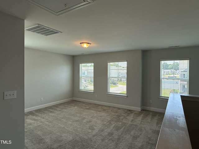 14 Gallop Rein Cir, Benson, NC 27504 - carpeted empty room featuring attic access and healthy amount of natural light