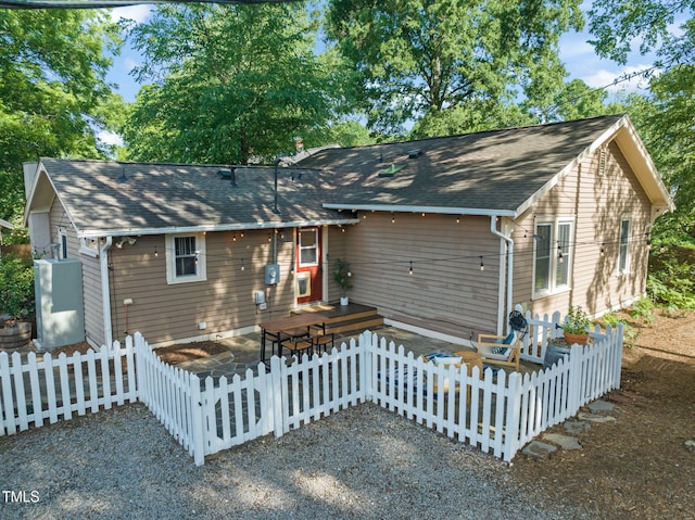 211 W Trinity Ave, Durham, NC 27701 - rustic home with a patio area and a shingled roof