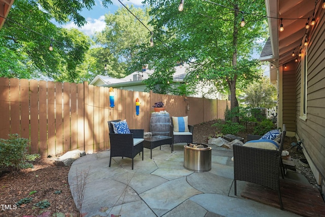 211 W Trinity Ave, Durham, NC 27701 - fenced backyard featuring a patio
