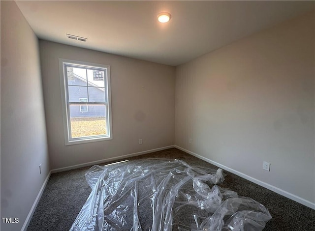 112 Dalton Dr, Lumber Bridge, NC 28357 - carpeted empty room with baseboards
