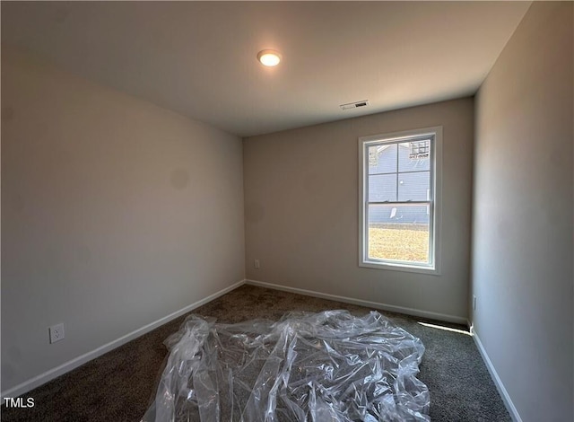 112 Dalton Dr, Lumber Bridge, NC 28357 - carpeted empty room featuring baseboards