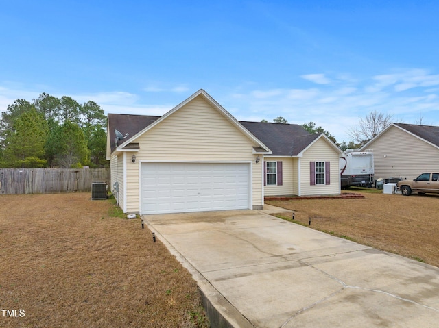 205 Driftwood Ln, Raeford, NC 28376 - traditional-style house featuring a garage and concrete driveway