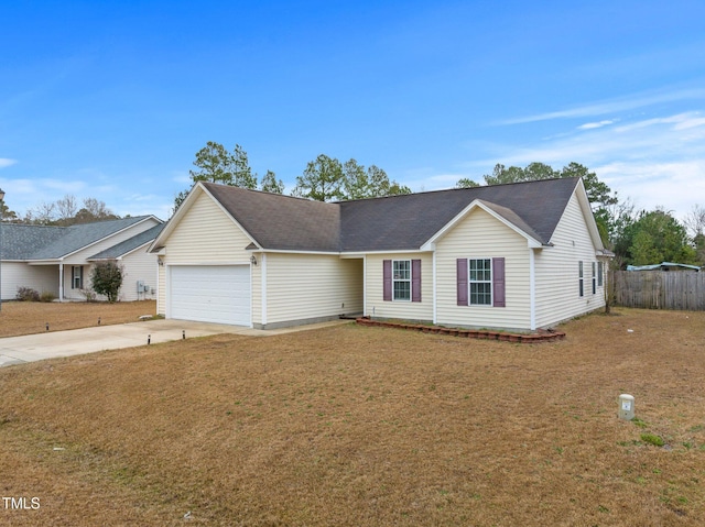 205 Driftwood Ln, Raeford, NC 28376 - ranch-style home featuring concrete driveway and a garage