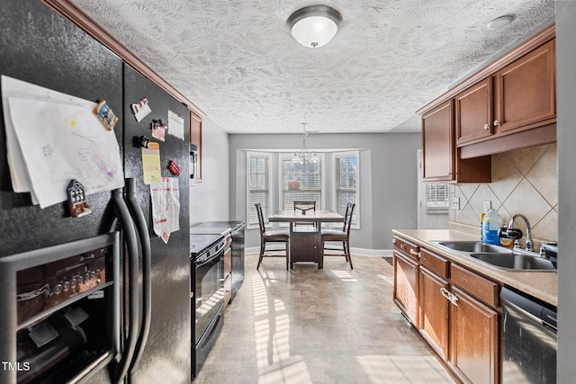 205 Driftwood Ln, Raeford, NC 28376 - kitchen featuring dishwasher, refrigerator with ice dispenser, black range with electric cooktop, backsplash, and decorative light fixtures