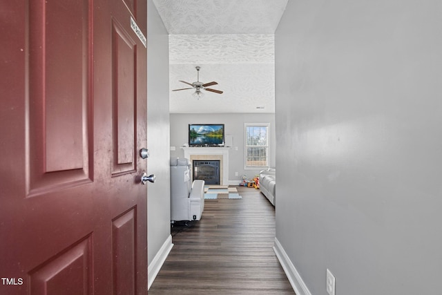 205 Driftwood Ln, Raeford, NC 28376 - hall with a textured ceiling and dark wood-style floors