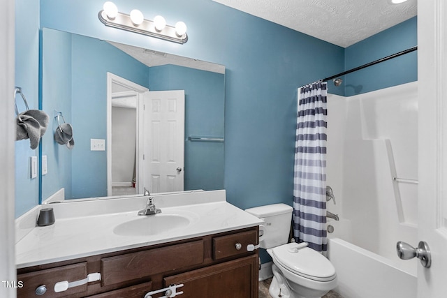 205 Driftwood Ln, Raeford, NC 28376 - bathroom with vanity, shower / tub combo with curtain, and a textured ceiling