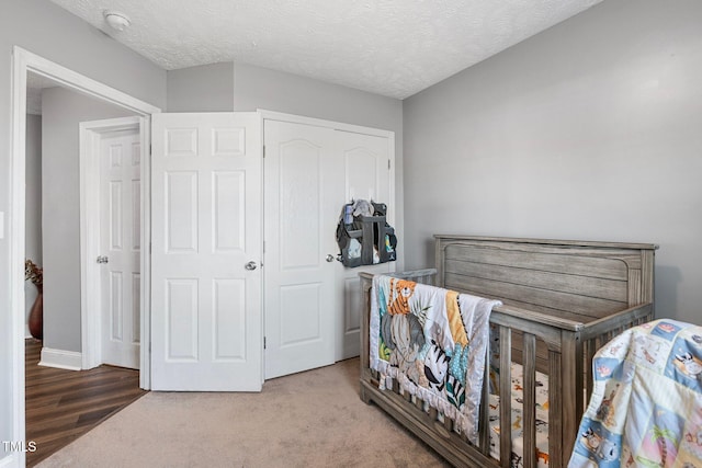 205 Driftwood Ln, Raeford, NC 28376 - bedroom featuring a textured ceiling and baseboards