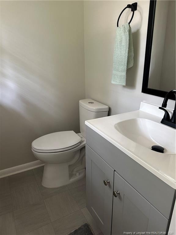 3513 Greenwood Dr, Fayetteville, NC 28311 - bathroom featuring vanity and toilet
