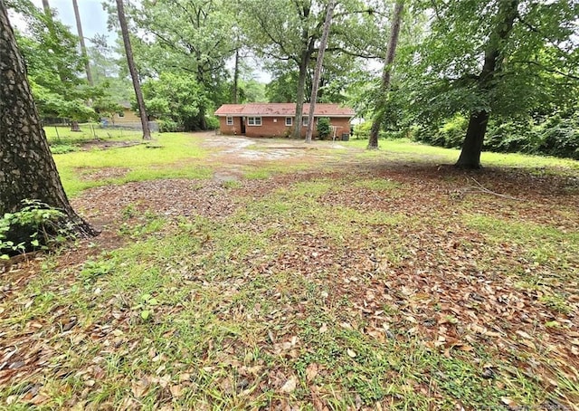 3513 Greenwood Dr, Fayetteville, NC 28311 - view of yard with view of wooded area