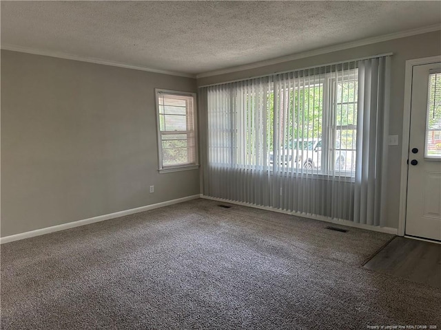 3513 Greenwood Dr, Fayetteville, NC 28311 - carpeted spare room with ornamental molding and a textured ceiling