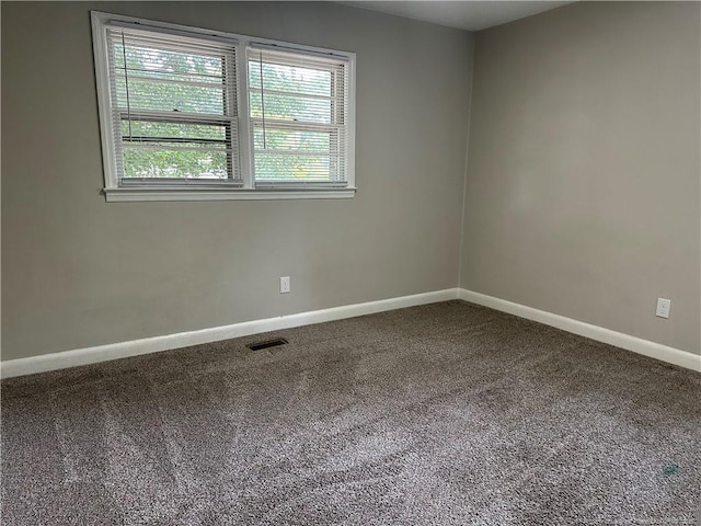 3513 Greenwood Dr, Fayetteville, NC 28311 - carpeted empty room featuring healthy amount of natural light