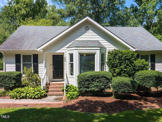 23 Joci Ct, Durham, NC 27704 - view of front facade with a shingled roof and entry steps