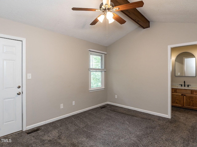 23 Joci Ct, Durham, NC 27704 - empty room featuring dark colored carpet, a ceiling fan, and a textured ceiling