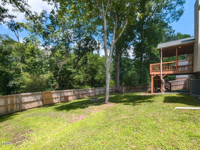 23 Joci Ct, Durham, NC 27704 - fenced backyard with stairway and a deck