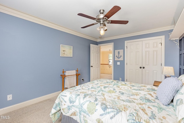 114 Boone Trl, Garner, NC 27529 - carpeted bedroom with a closet, ornamental molding, and ceiling fan