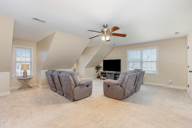 114 Boone Trl, Garner, NC 27529 - carpeted living room with healthy amount of natural light and a ceiling fan