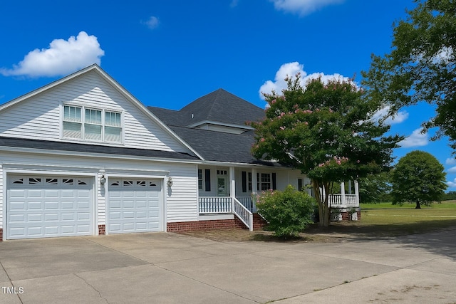 1768 Greens Bridge Rd, Garland, NC 28441 - traditional home with covered porch, driveway, an attached garage, and roof with shingles