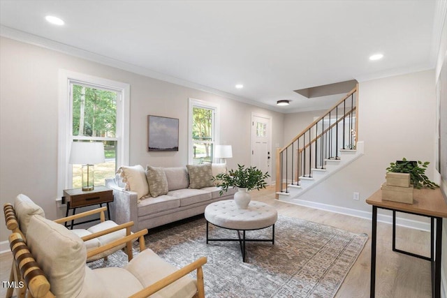 4006 New Yarmouth Way, Apex, NC 27502 - living room with wood finished floors, ornamental molding, stairs, and recessed lighting