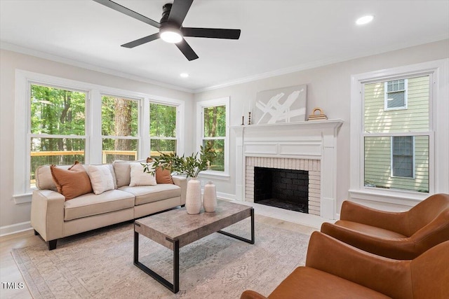 4006 New Yarmouth Way, Apex, NC 27502 - living room with crown molding, ceiling fan, a brick fireplace, light wood-style flooring, and recessed lighting