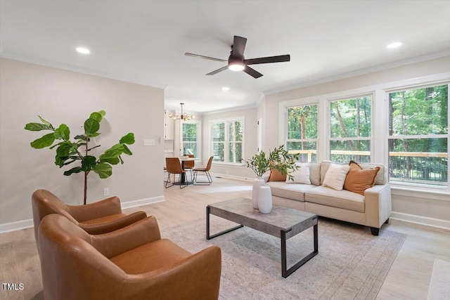 4006 New Yarmouth Way, Apex, NC 27502 - living room with crown molding, a chandelier, light wood-style flooring, a ceiling fan, and recessed lighting