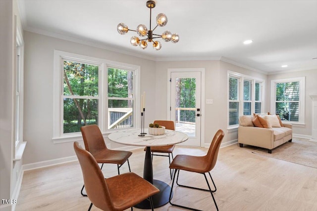 4006 New Yarmouth Way, Apex, NC 27502 - dining space with a chandelier, light wood-type flooring, plenty of natural light, ornamental molding, and recessed lighting