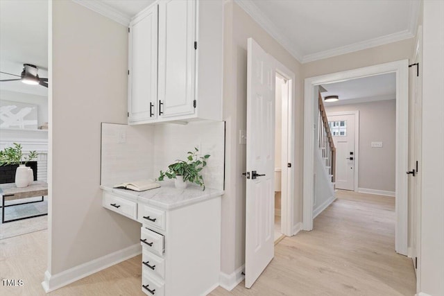 4006 New Yarmouth Way, Apex, NC 27502 - hall with light wood finished floors, ornamental molding, and stairway