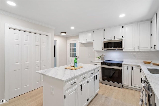 4006 New Yarmouth Way, Apex, NC 27502 - kitchen with stainless steel appliances, crown molding, light wood-type flooring, recessed lighting, and light stone countertops