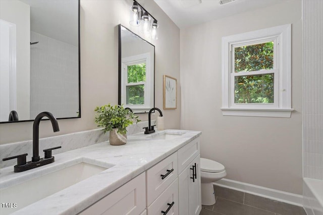 4006 New Yarmouth Way, Apex, NC 27502 - bathroom with plenty of natural light, tile patterned flooring, double vanity, and shower / bath combination