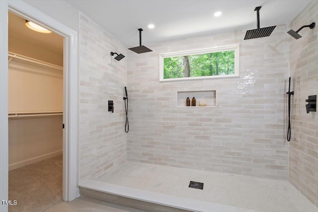 4006 New Yarmouth Way, Apex, NC 27502 - full bathroom featuring a tile shower, a spacious closet, and recessed lighting