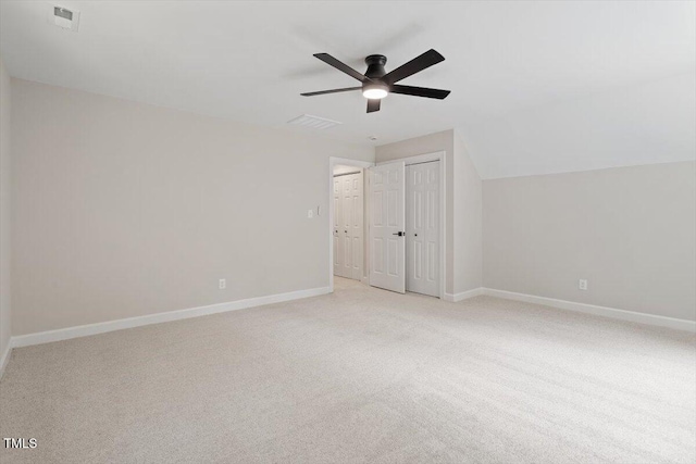 4006 New Yarmouth Way, Apex, NC 27502 - unfurnished bedroom with light colored carpet, a closet, a ceiling fan, and lofted ceiling