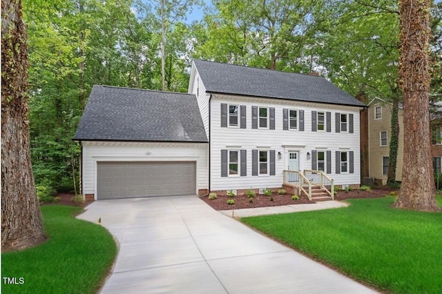 4006 New Yarmouth Way, Apex, NC 27502 - colonial inspired home featuring a garage, driveway, a front lawn, and a shingled roof