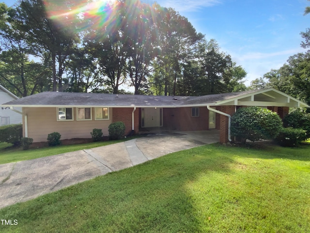 3721 Suffolk St, Durham, NC 27707 - single story home featuring driveway, a front lawn, an attached carport, and brick siding
